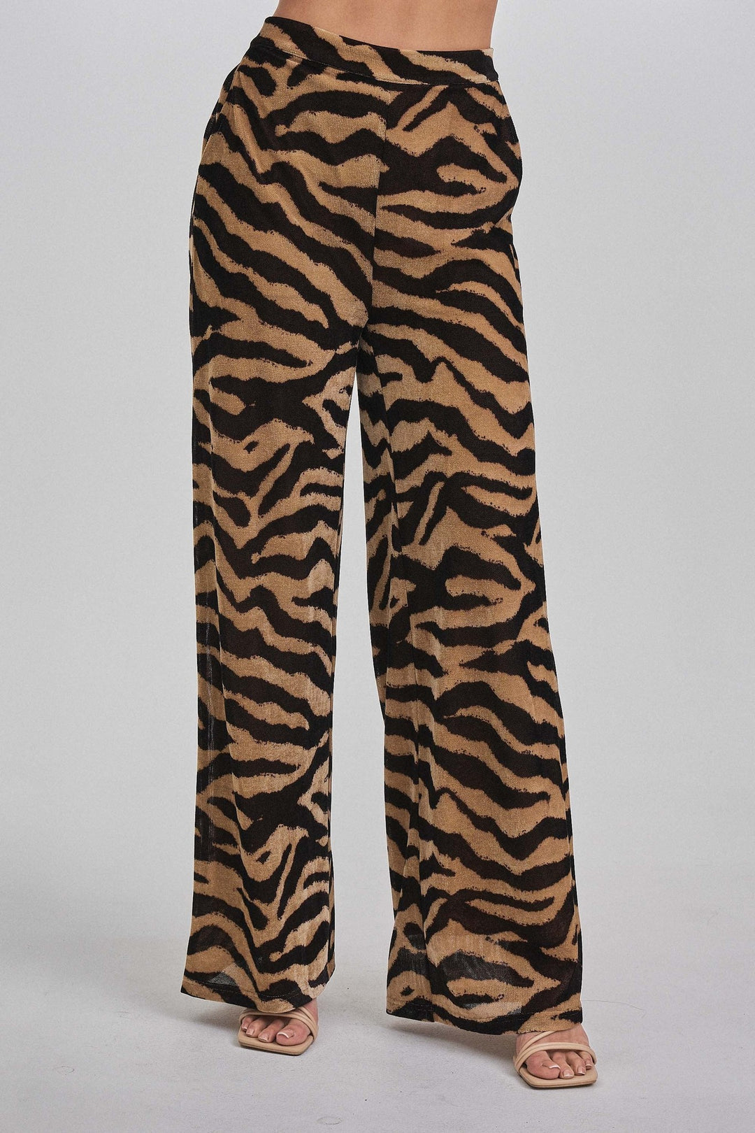Close up of the zebra print knit on the wide leg pants