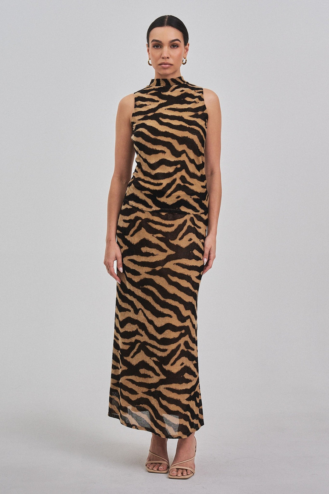 Zebra print mock neck top styled with the zebra maxi skirt