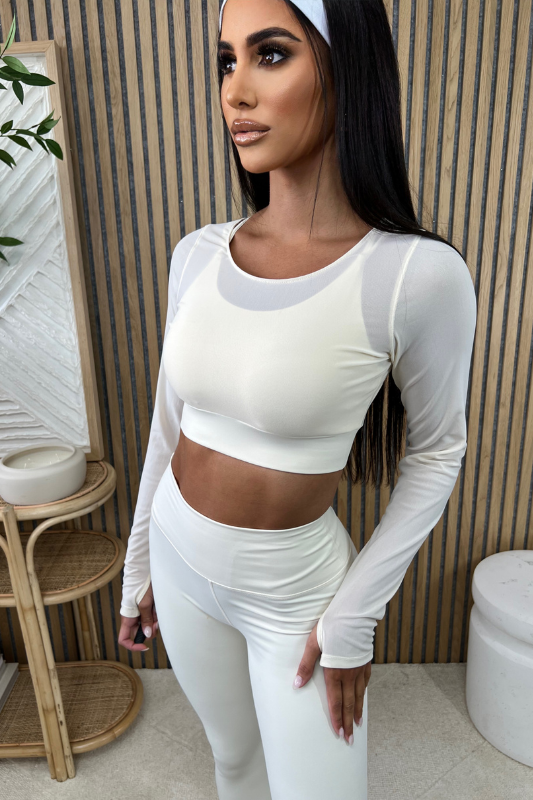 STYLED BY ALX COUTURE MIAMI BOUTIQUE Cream Long Sleeve Light Support Bra Top Paired With Cream Aligned Performance High-Rise Leggings For An Active Look