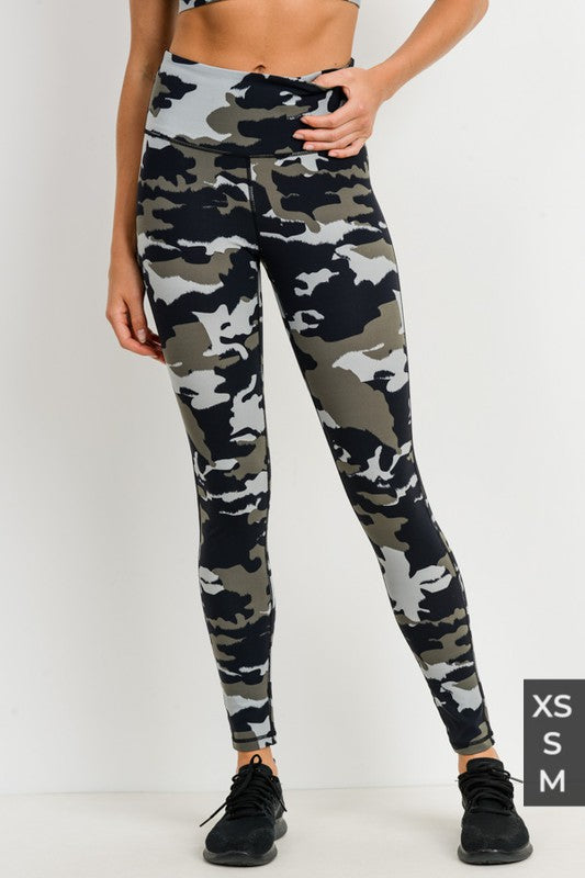 JUNGLE CAMO HIGH WAIST LEGGINGS  old and stealthy, these leggings are constructed  with a four-way stretch fabric. They feature a high waist band for abs support and a discreet inner pocket for your essentials
