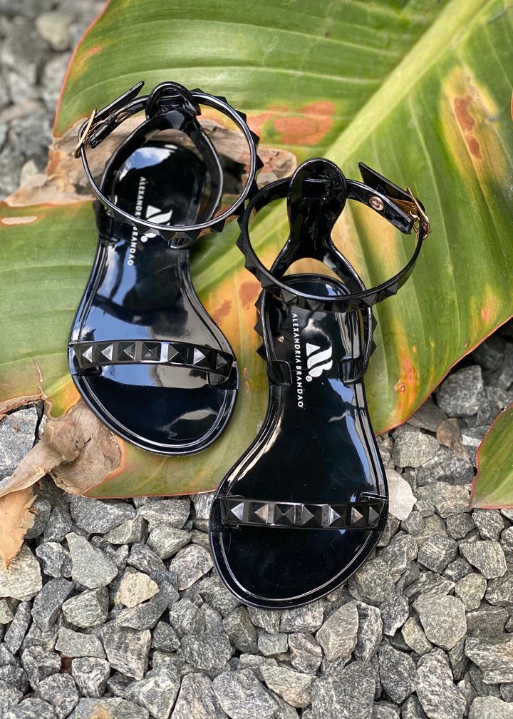 Kid's Aria Black Sandals with thin strap around the ankle this sandal is perfect for beach and pool days, you can wear them with  a casual chic look