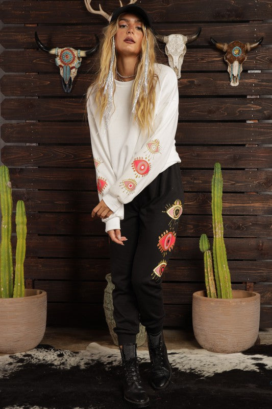 STYLED BY ALX COUTURE MIAMI BOUTIQUE Black Red Evil Eye Sweatpants