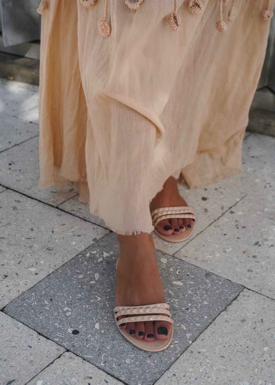 ARIA B THREE STRAP STUDDED SLIP ONS IN SOLID NUDE . Jelly sandals perfect for summer, sandals that you can wear all day long.