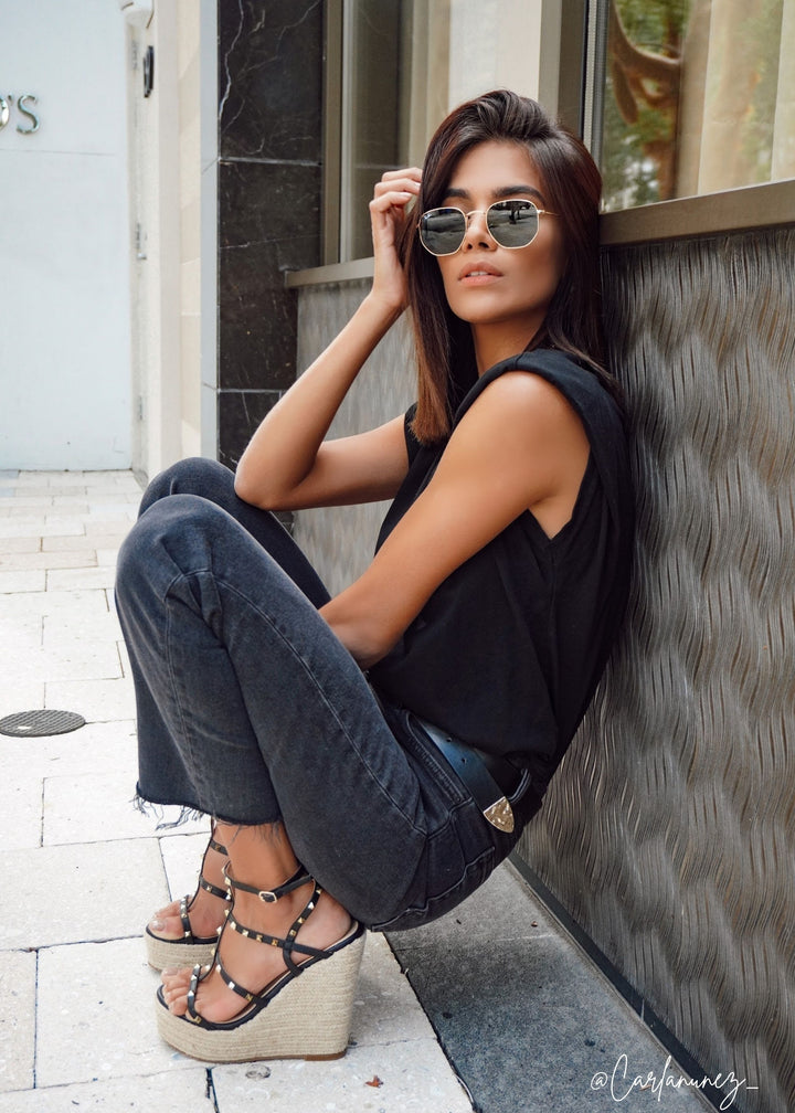 Carla Nunez a Miami blogger wearing black jeans and a black simple top with Alexandria Brandao Shoes wedge, Astrid wedge in black.