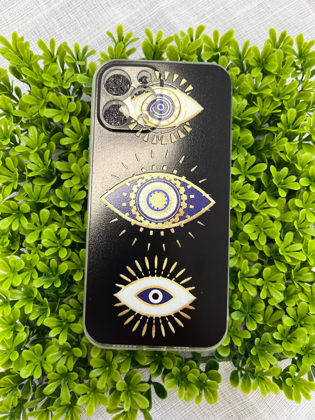 STYLED BY ALX COUTURE MIAMI BOUTIQUEEvil Eye iPhone Case