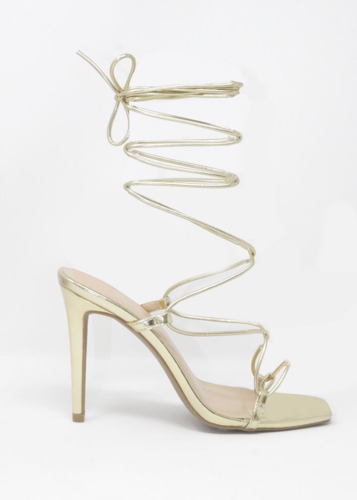 Ana Heels in Metallic Gold with Thong-like toe strap and lace up strings