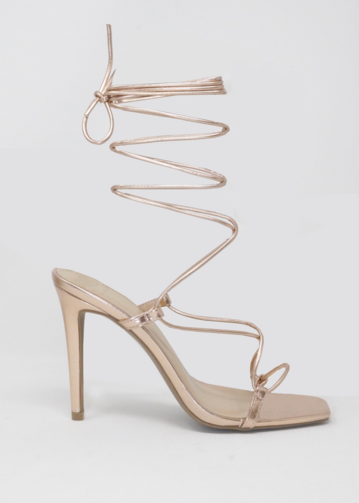 Ana rose gold lace up leather rose gold heels. Side view