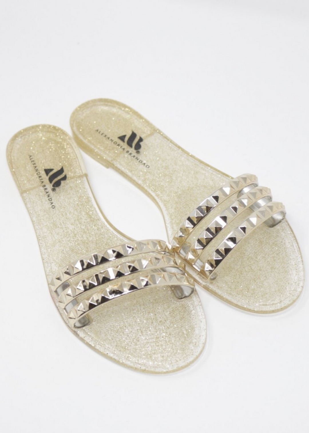 ARIA B GOLD THREE STRAP STUDDED SLIP ONS WITH GLITTER SOLE IN GOLD