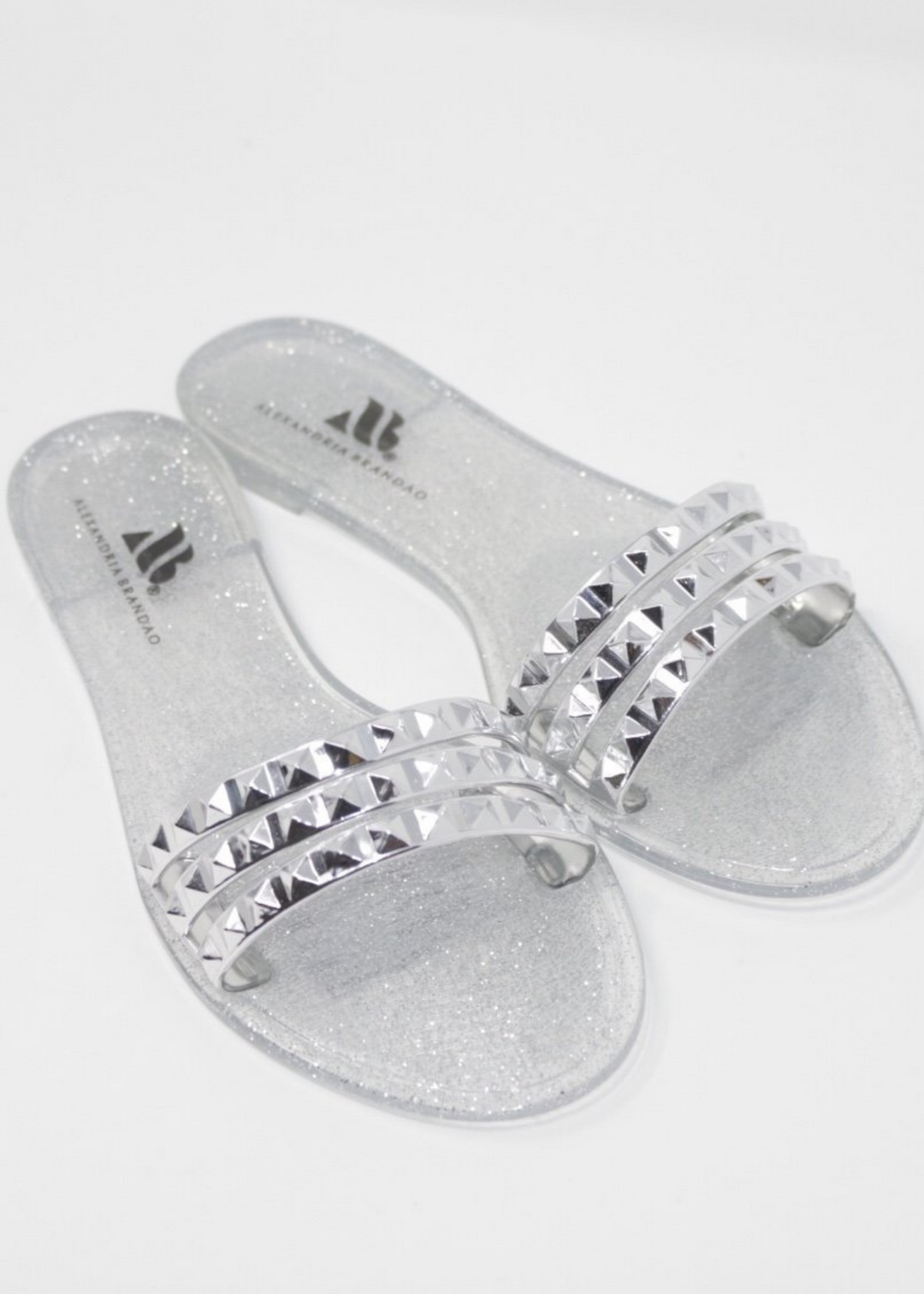 Women's Aria B silver waterproof slide on jelly sandals by Alexandria Brandao