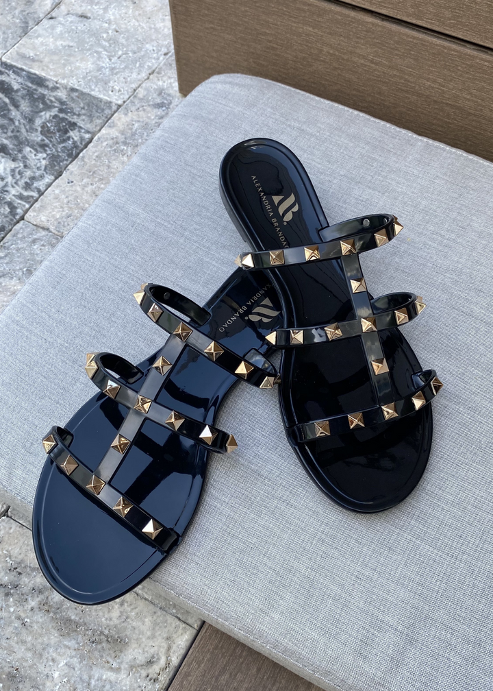 Women's Aurora jelly slide sandal in black.